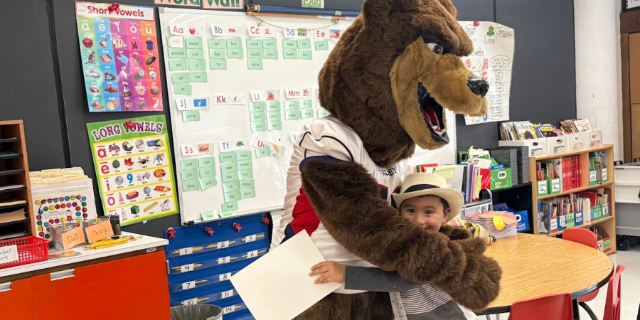 Elementary student receiving a BEAR Award